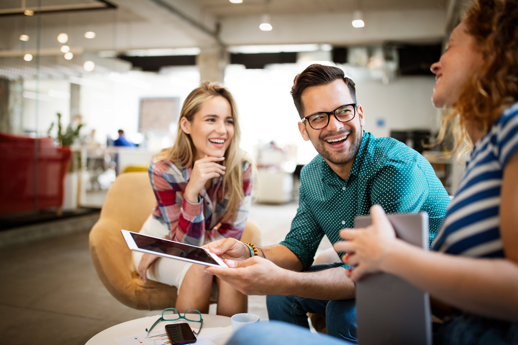 Photo of business people, having fun and chatting at workplace office