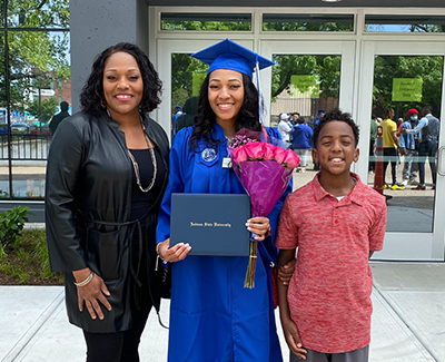 Photo of Ashley celebrating her graduation from Indiana State University in June 2021.