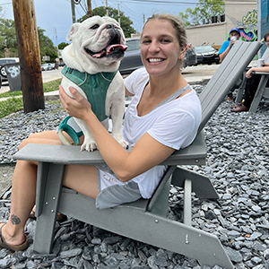 Photo of Madeline with her English bulldog, Harley